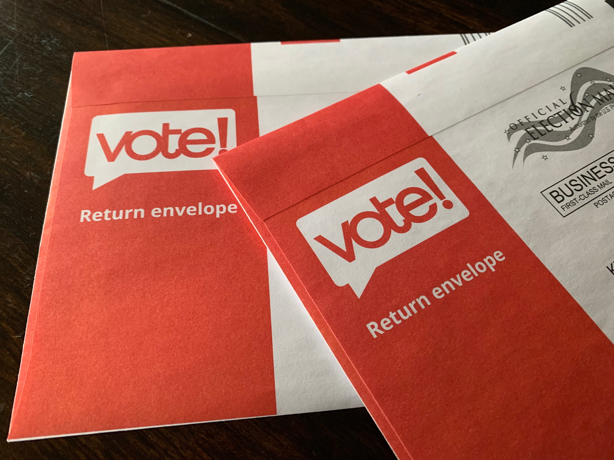 photo of two vote by mail envelopes