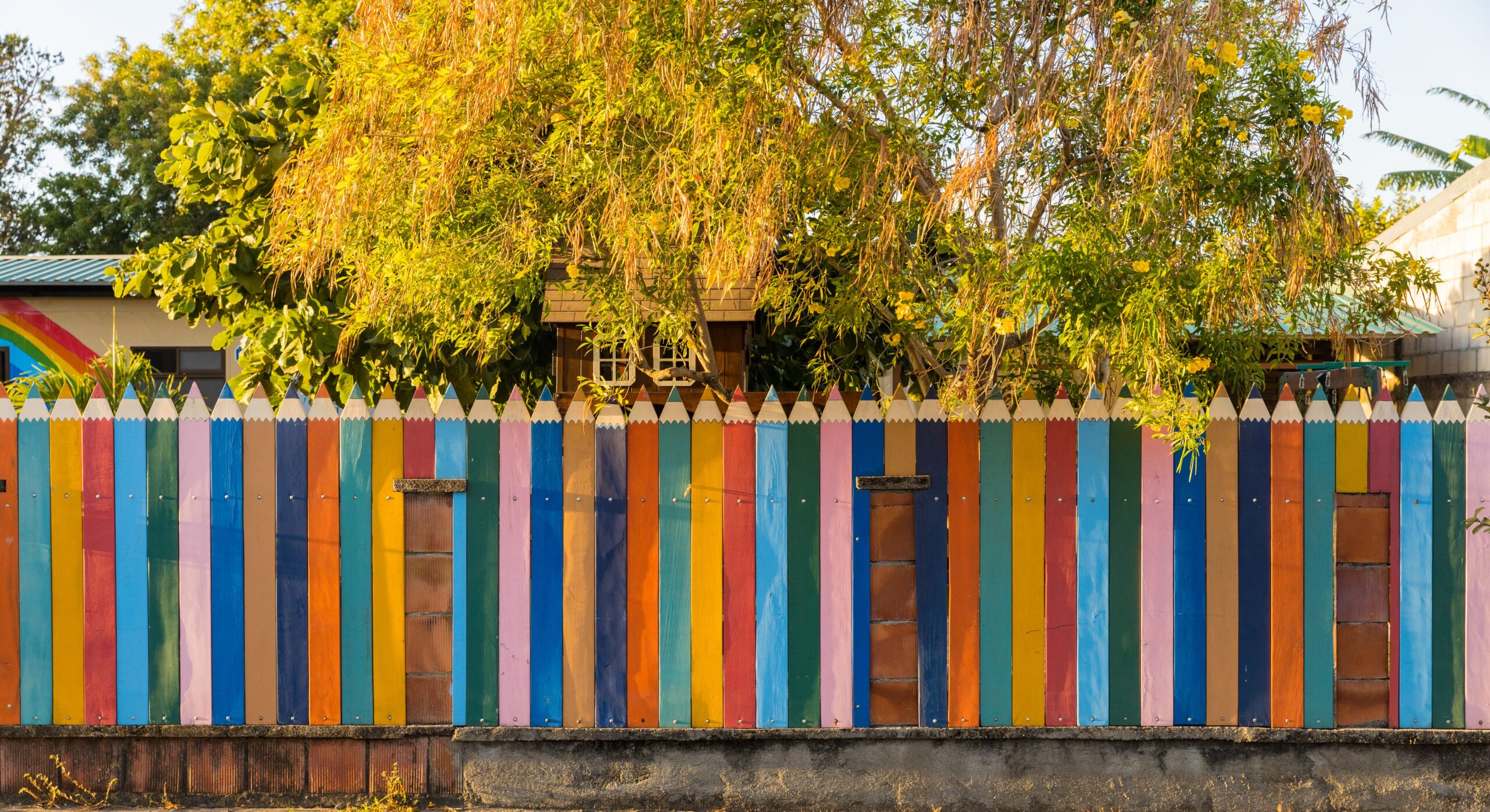 Photo of a fence decorated as crayons.